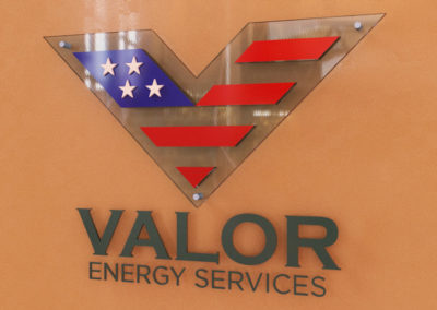 Picture of a V shaped sign with American flag colors.