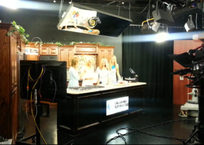 Photo of television appearance arranged by Electremedia.