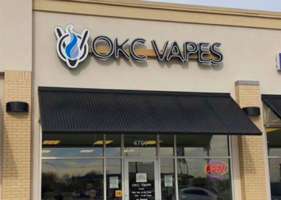 Picture of exterior sign for OKC Vapes in Del City.